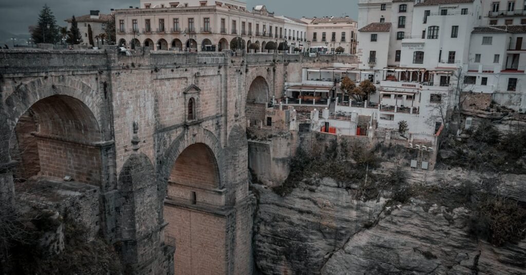 Dramatic view of Ronda's Puente Nuevo bridge over El Tajo gorge in Spain.