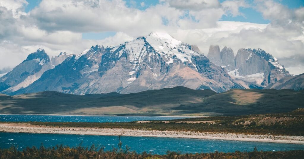 Scenic landscape of Torres del Paine mountains and lake in Chilean Patagonia.