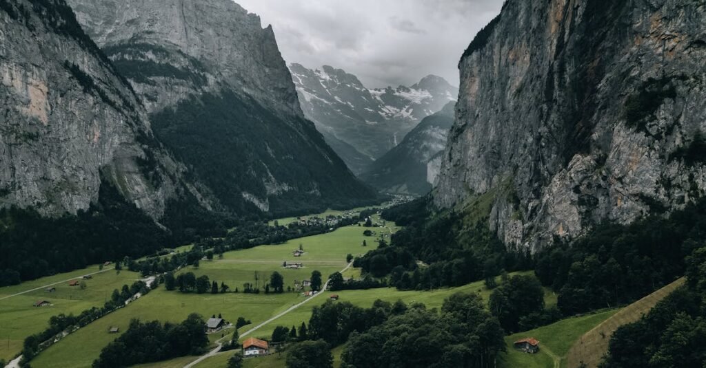 A stunning aerial view of Lauterbrunnen Valley surrounded by majestic Swiss Alps.