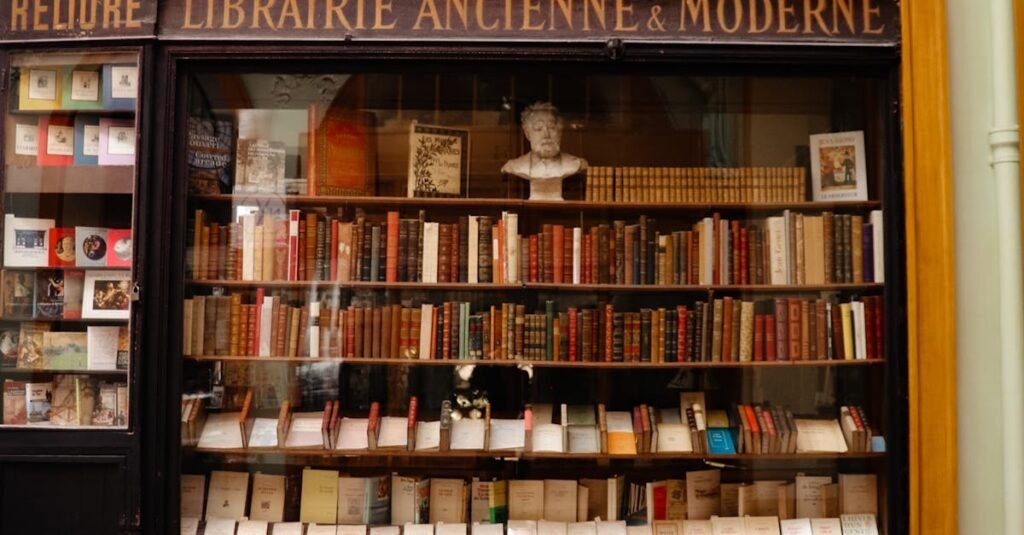 Charming exterior of a vintage bookshop with classic books and arched window display.