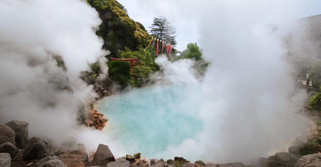 Geothermal hot spring with steam and rocky surroundings in Beppu, Japan, famous for its hot spring hells.